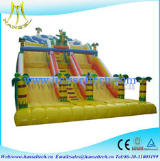 China Hansel attractive kids amusement park games inflatable climbing wall with slide proveedor