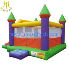 China Hansel stock largest inflatable bouncer castle with slide in amusement park in China proveedor
