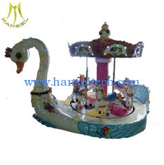 China Hansel large electronic fiberglass swan carousel ride for kids proveedor