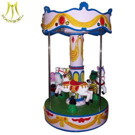 Hansel   high quality China indoor kids amusement rides for sale 3 seats carousel horse ride proveedor