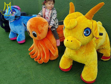 Hansel indoor playground unicorn motorized plush animal electric scooter proveedor