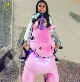 Hansel  unicorn motorized plush animal toy horse on wheels for kids proveedor