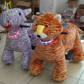 Hansel hot selling children games stuffed ride on plush motorized animals proveedor