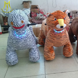 Hansel Guangzhou plush moving toy animal toy horse on 4 wheels for kids proveedor